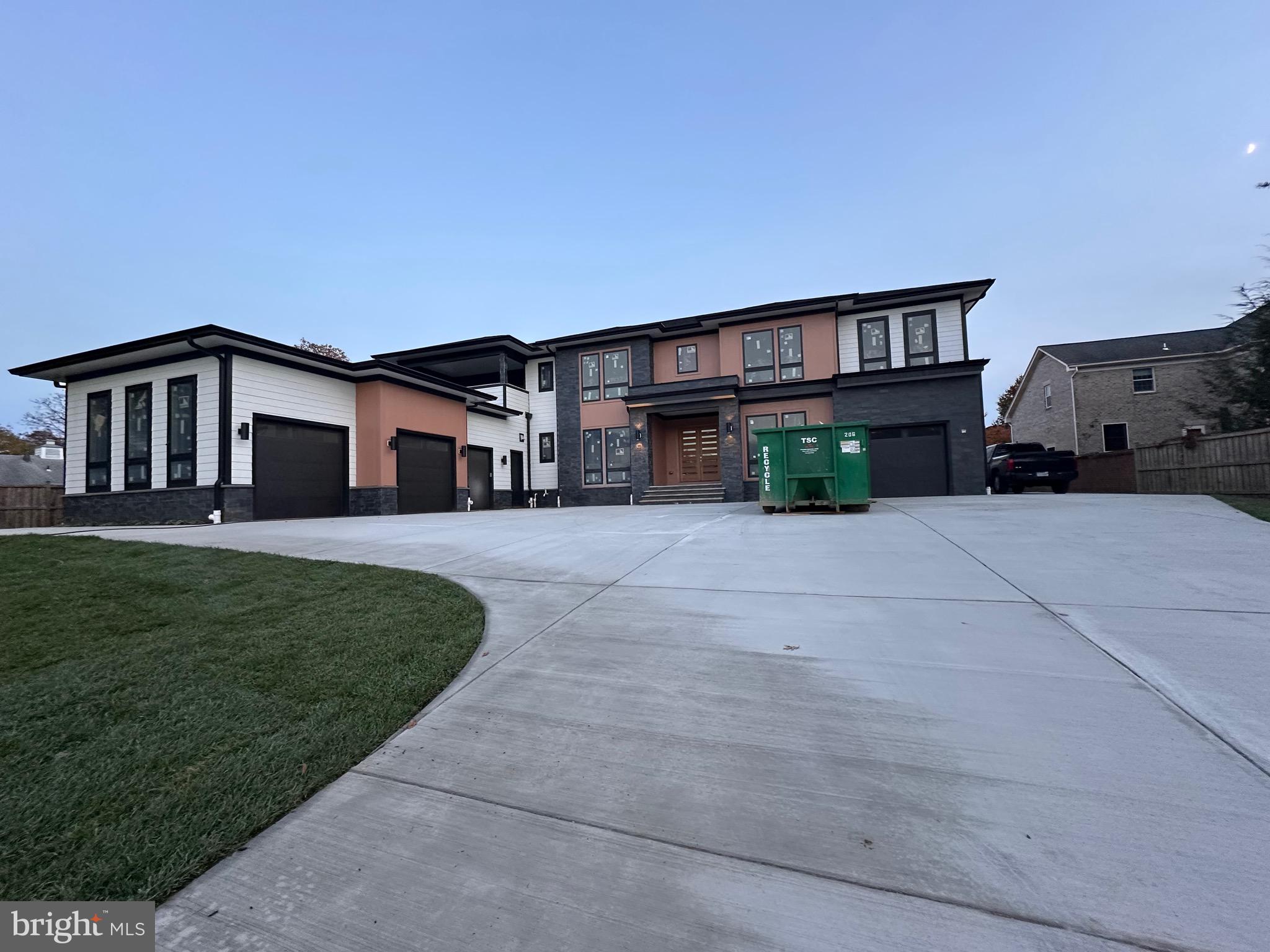 2113 Chain Bridge Road Vienna, VA 22182 - Photo 4 of 8 a house view with a garden space