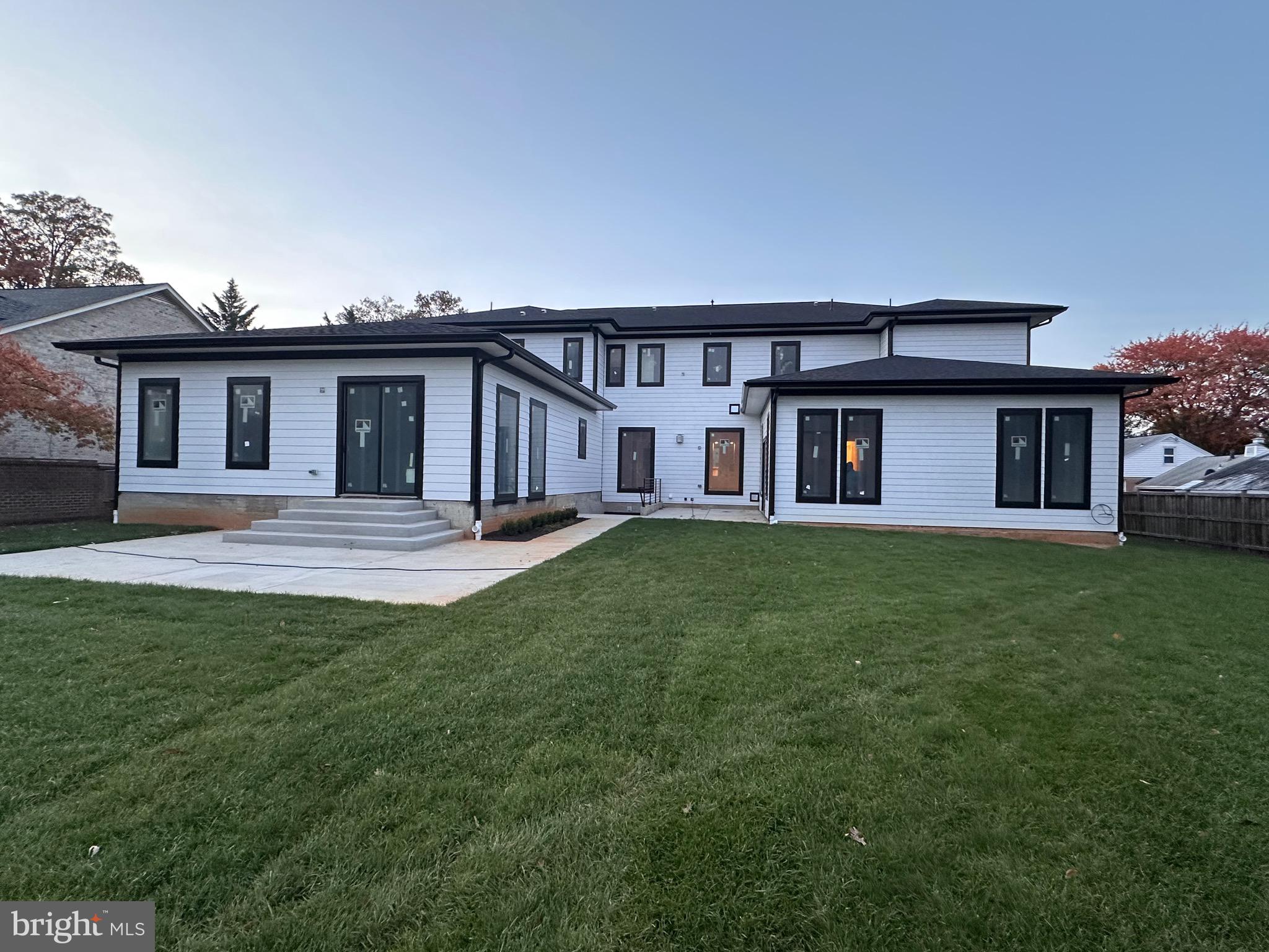 2113 Chain Bridge Road Vienna, VA 22182 - Photo 6 of 8 a front view of a house with a yard