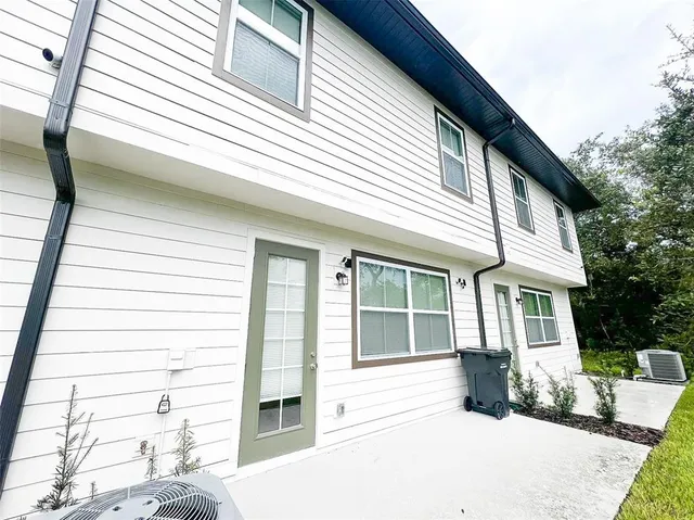 a view of a house with a patio