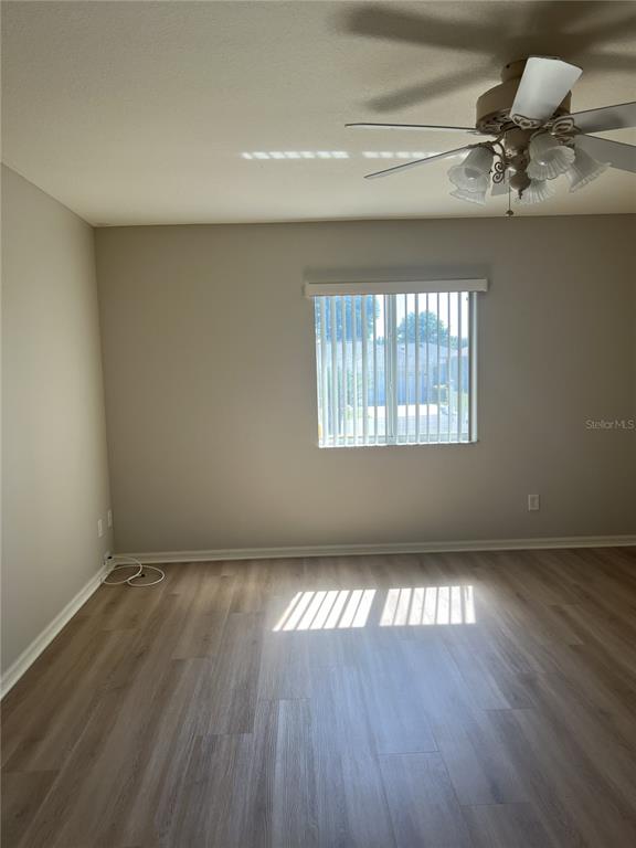6035 Southwest 98th Street Road Ocala, FL 34476 - Photo 5 of 15 a view of an empty room and window