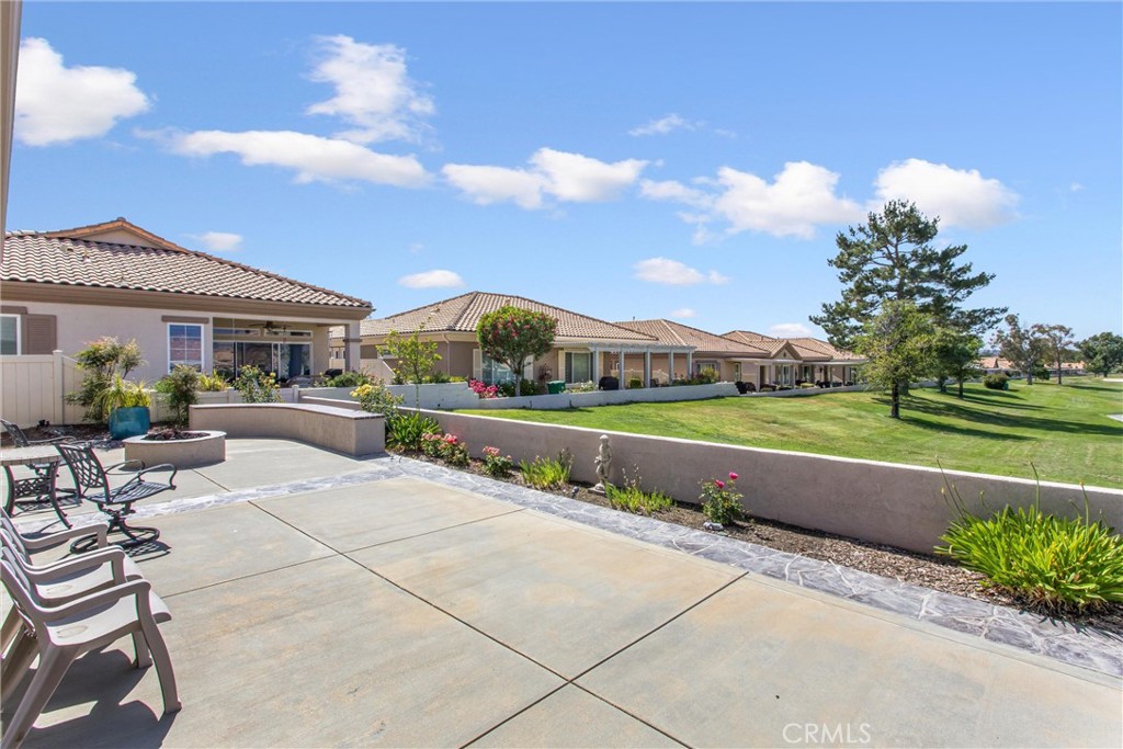 5233 Hampton Road Banning, CA 92220 - Photo 27 of 46 a view of swimming pool and outdoor seating