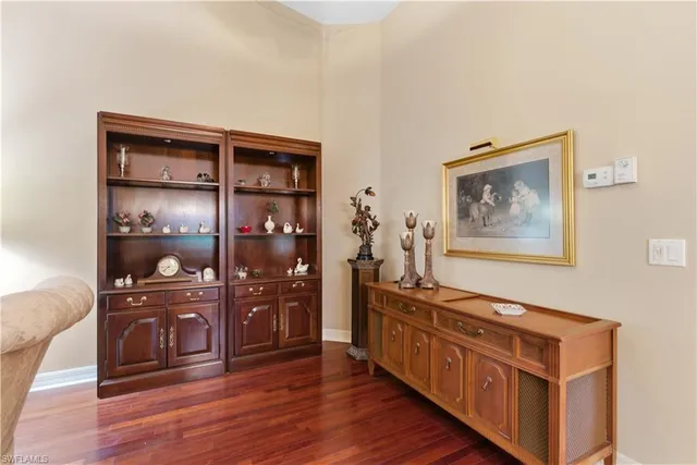 a kitchen with stainless steel appliances a stove top oven and a refrigerator