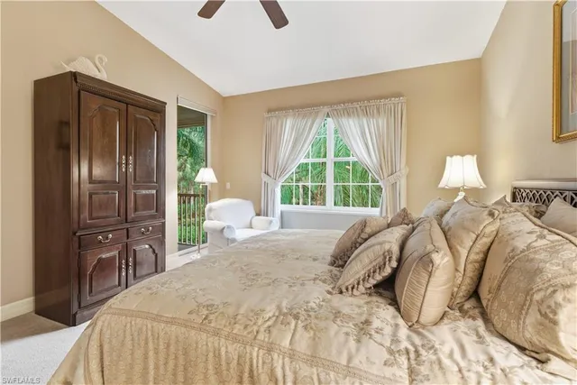 a bedroom with a bed dresser and a window