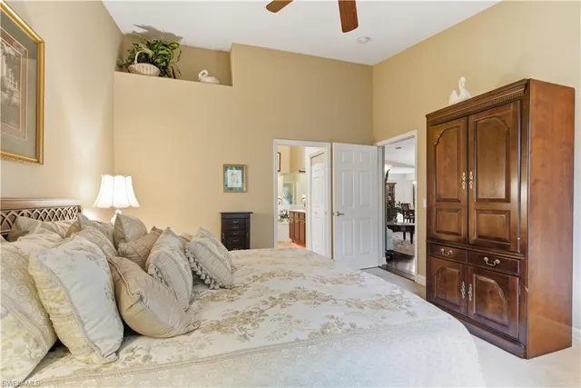 a bed room with a bed and a television