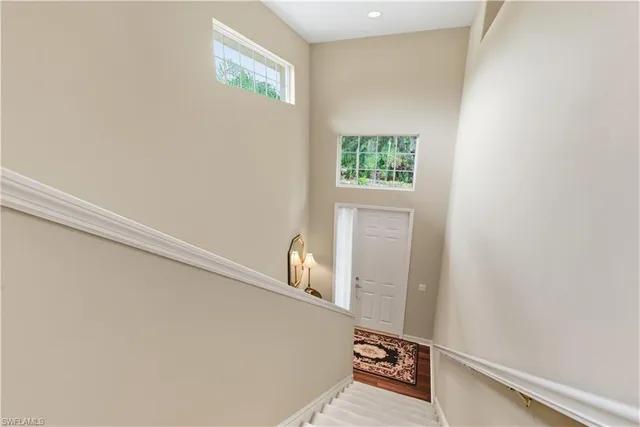 a view of a hallway with closet