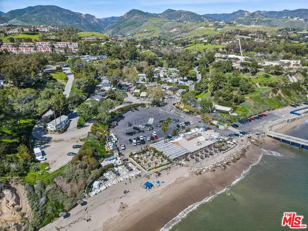 an aerial view of residential house with outdoor space