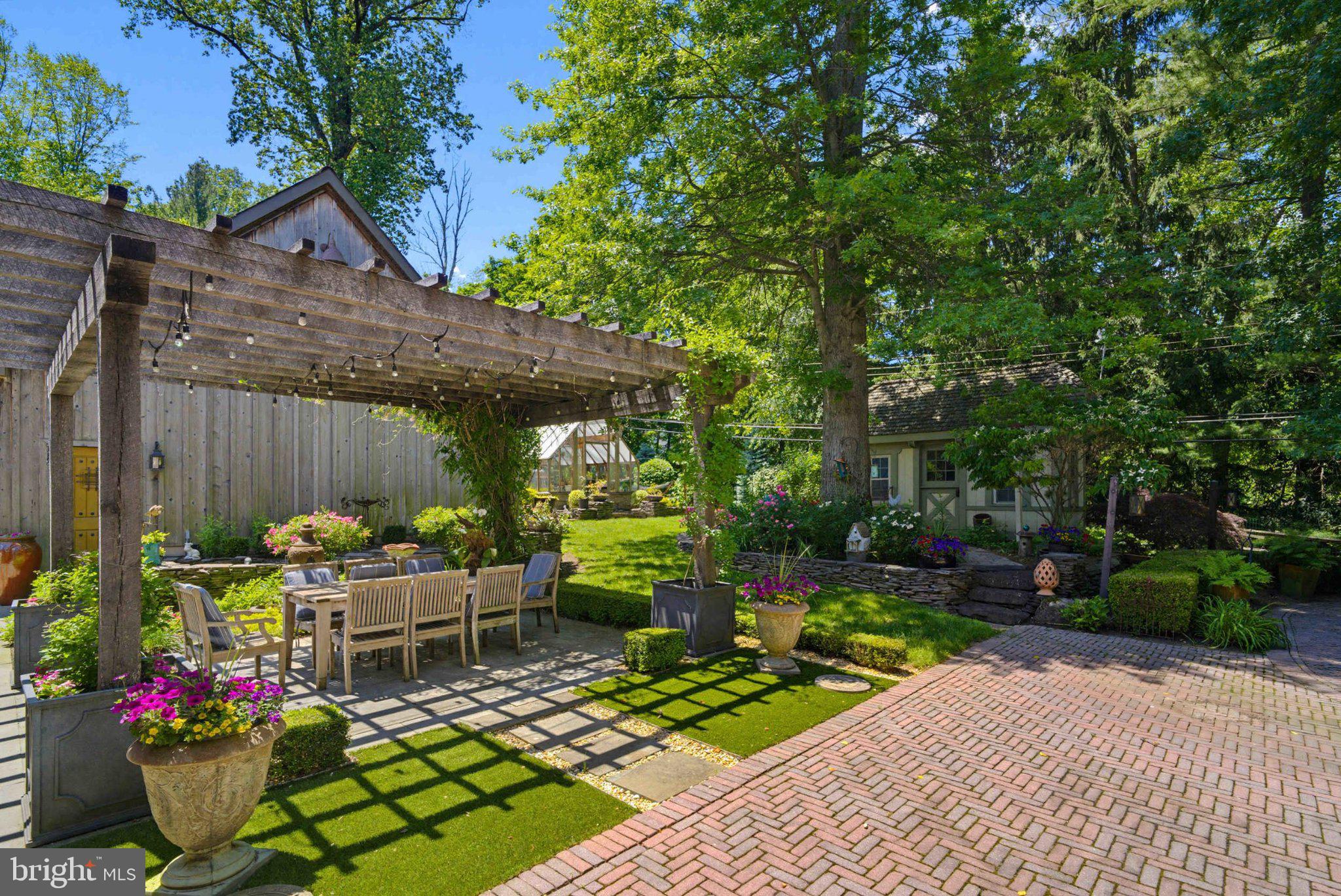 2244 Deer Path Road Huntingdon Valley, PA 19006 - Photo 79 of 95 Lush garden oasis with charming patio.