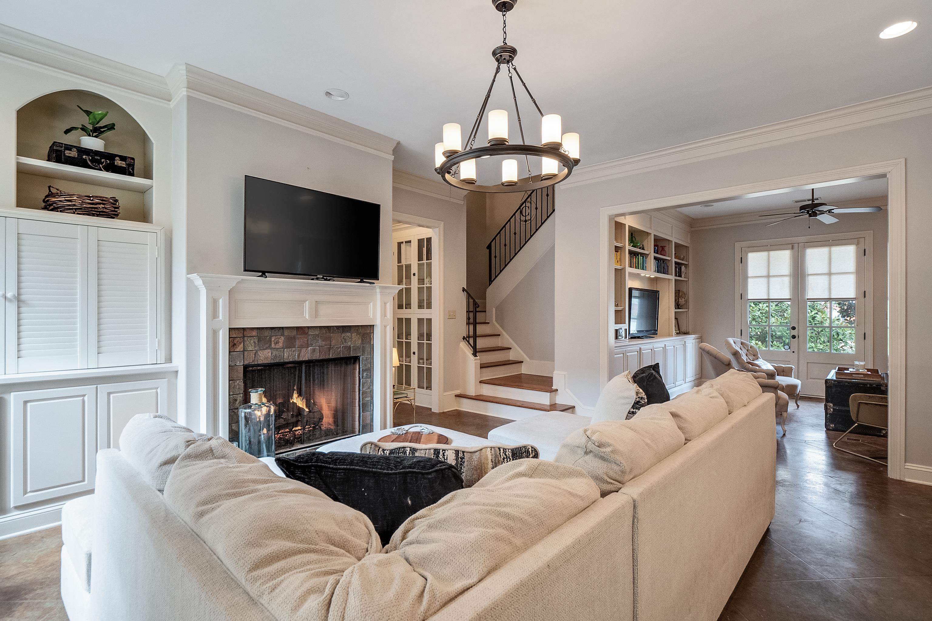187 Ridgefield Road Memphis, TN 38111 - Photo 15 of 34 a living room with furniture a flat screen tv and a fireplace