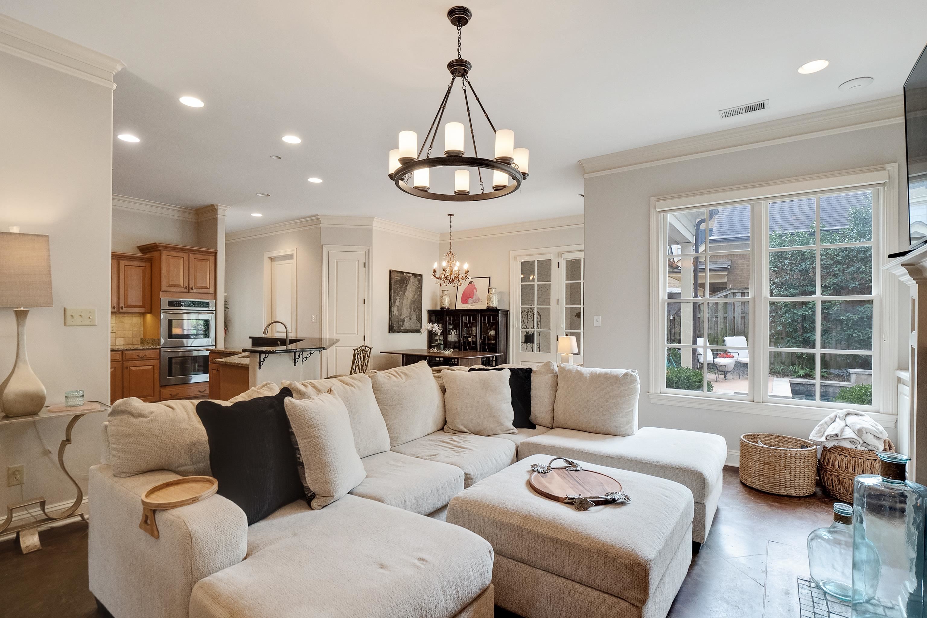 187 Ridgefield Road Memphis, TN 38111 - Photo 29 of 34 a living room with furniture kitchen and a chandelier
