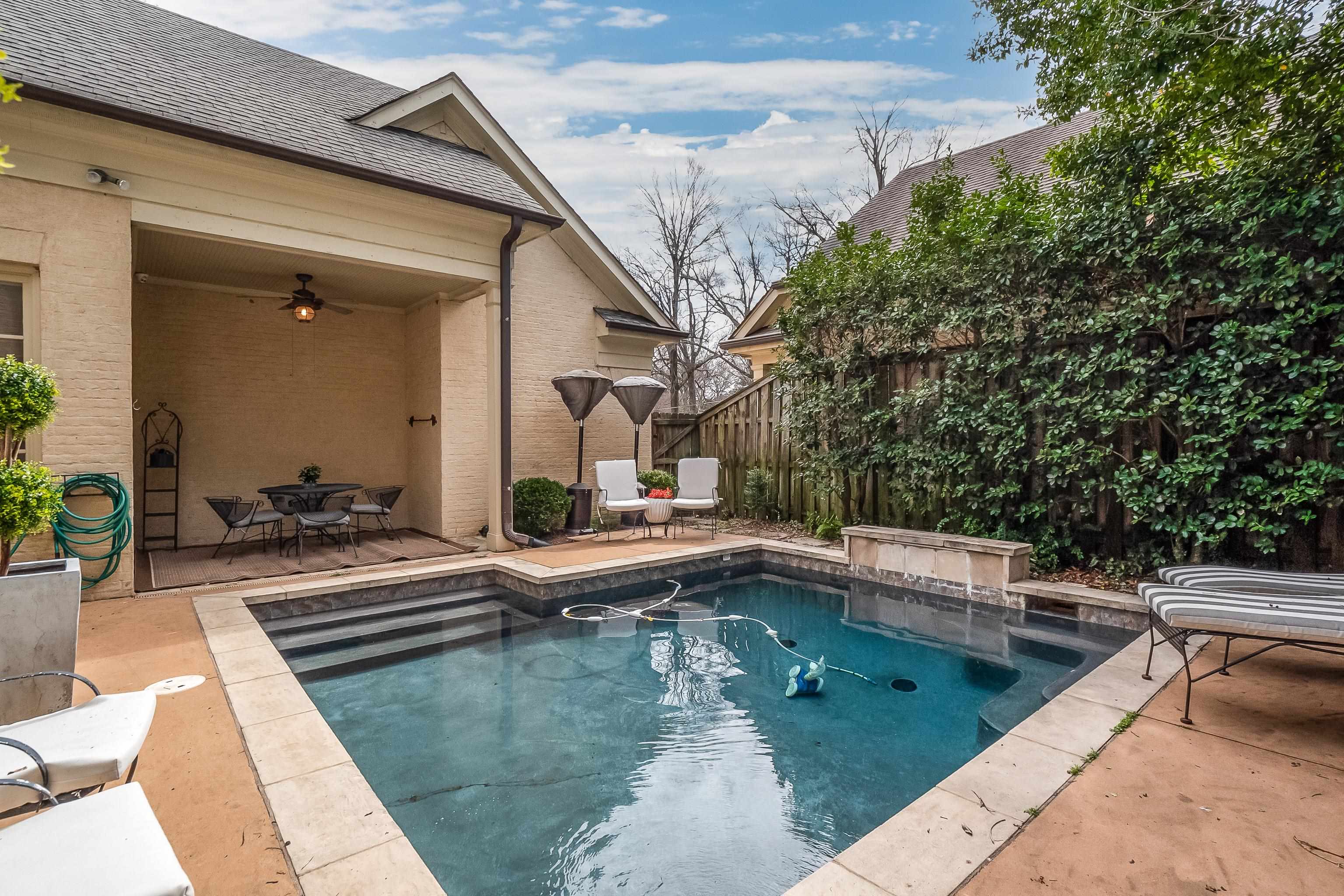 187 Ridgefield Road Memphis, TN 38111 - Photo 33 of 34 a view of a swimming pool with a patio