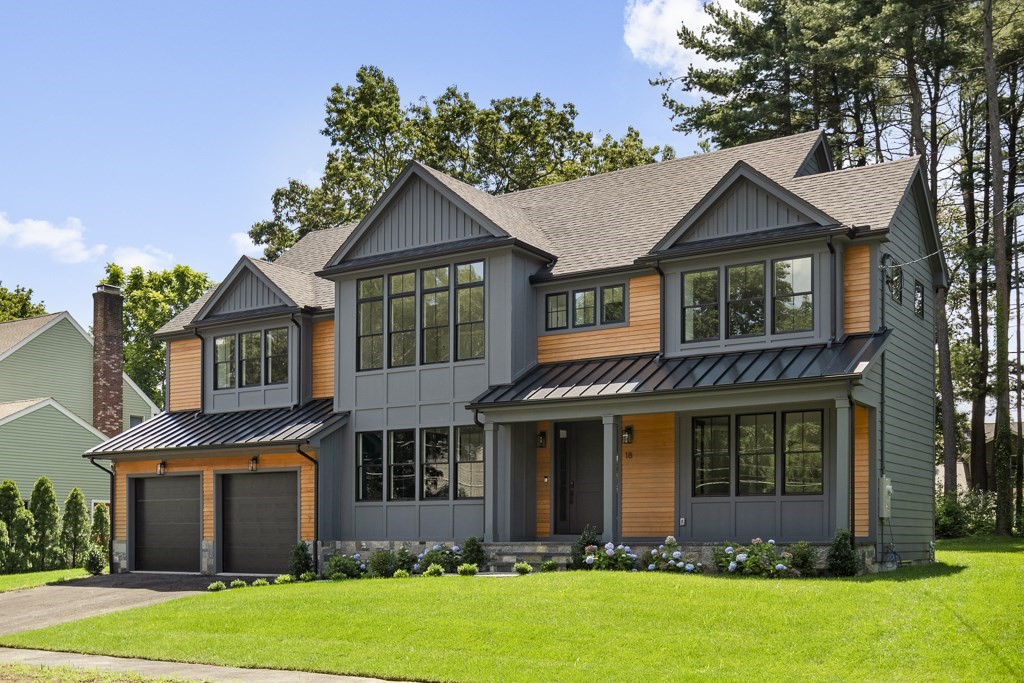 front view of brick house with a yard
