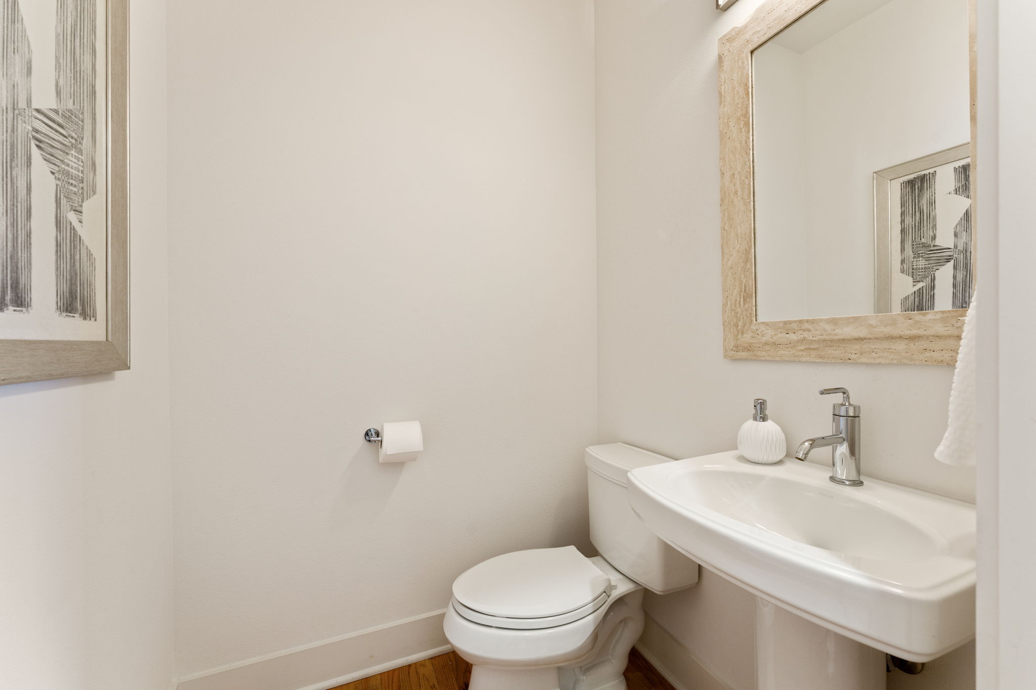1305 Exposition Boulevard, Unit 4 Austin, TX 78703 - Photo 17 of 29 a bathroom with a sink toilet and a mirror