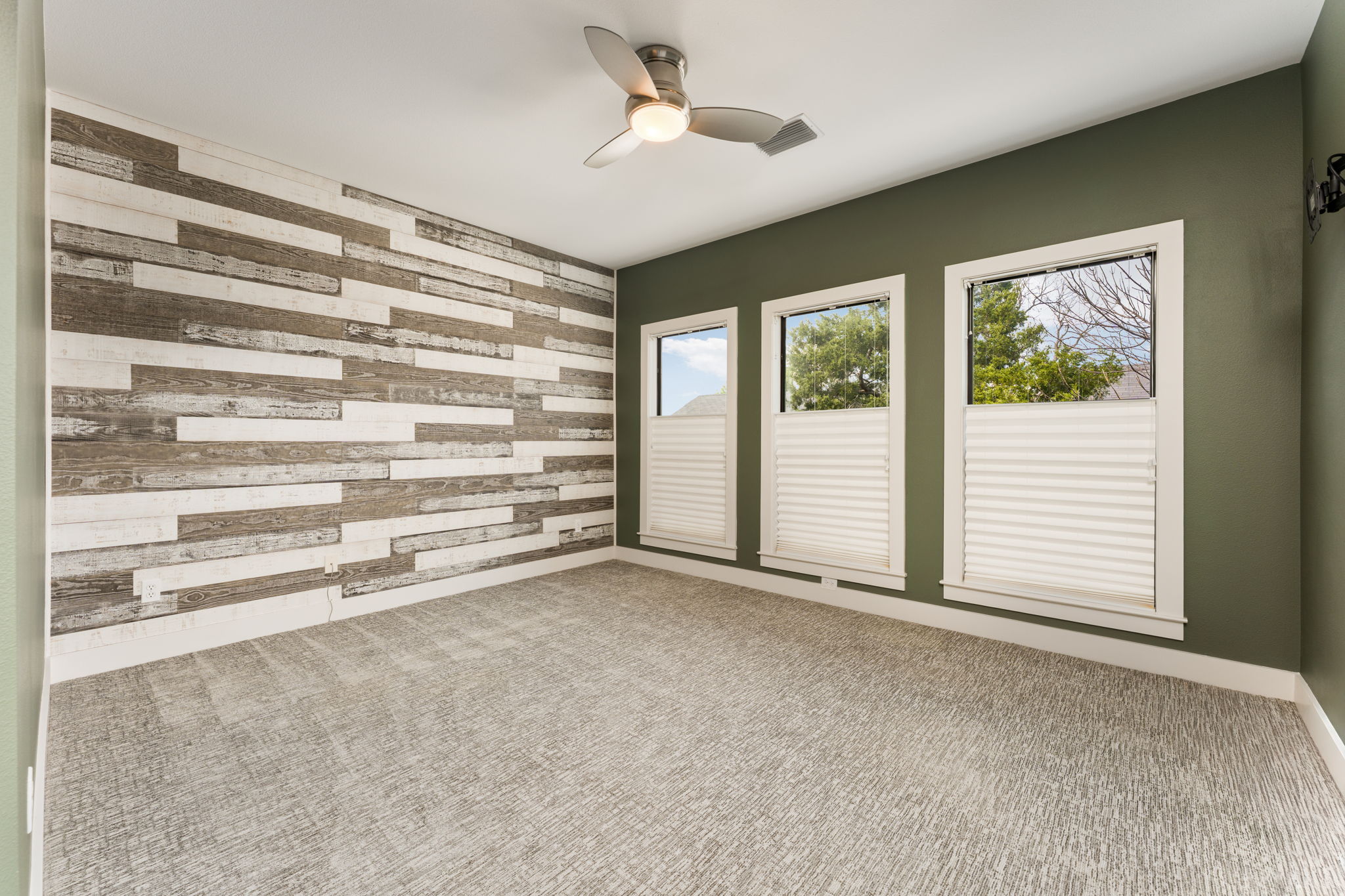 1305 Exposition Boulevard, Unit 4 Austin, TX 78703 - Photo 25 of 29 a view of room with a ceiling fan