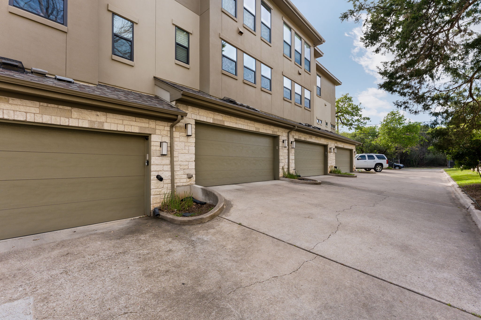 1305 Exposition Boulevard, Unit 4 Austin, TX 78703 - Photo 29 of 29 a front view of a house with barbeque area