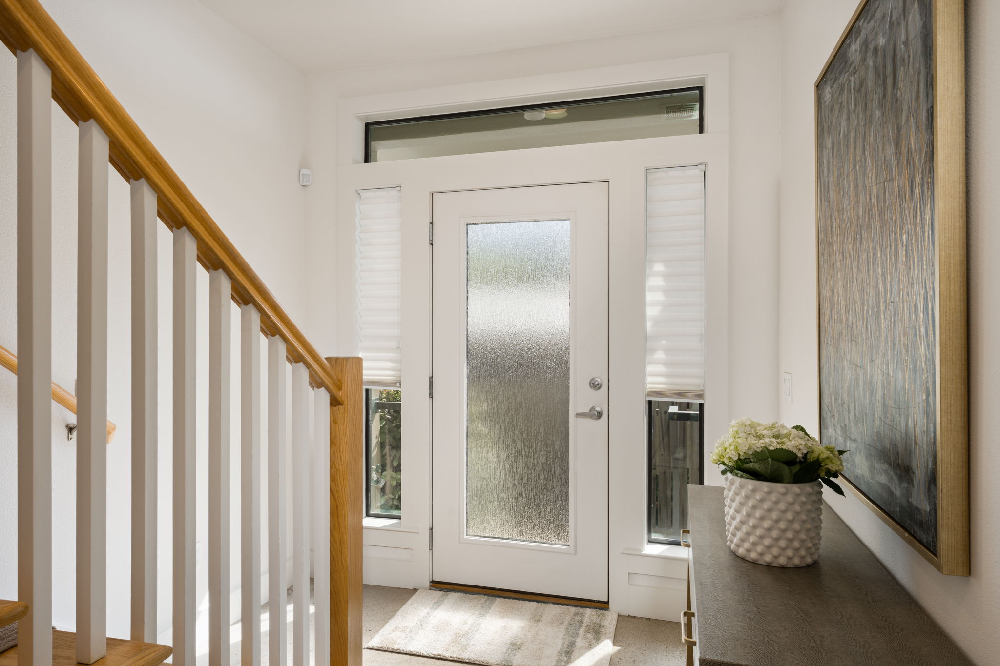 1305 Exposition Boulevard, Unit 4 Austin, TX 78703 - Photo 3 of 29 a view of entryway with wooden floor and livingroom view