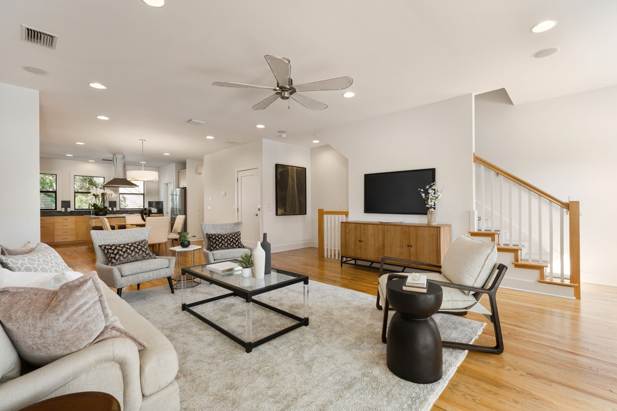 1305 Exposition Boulevard, Unit 4 Austin, TX 78703 - Photo 4 of 29 a living room with furniture and a flat screen tv