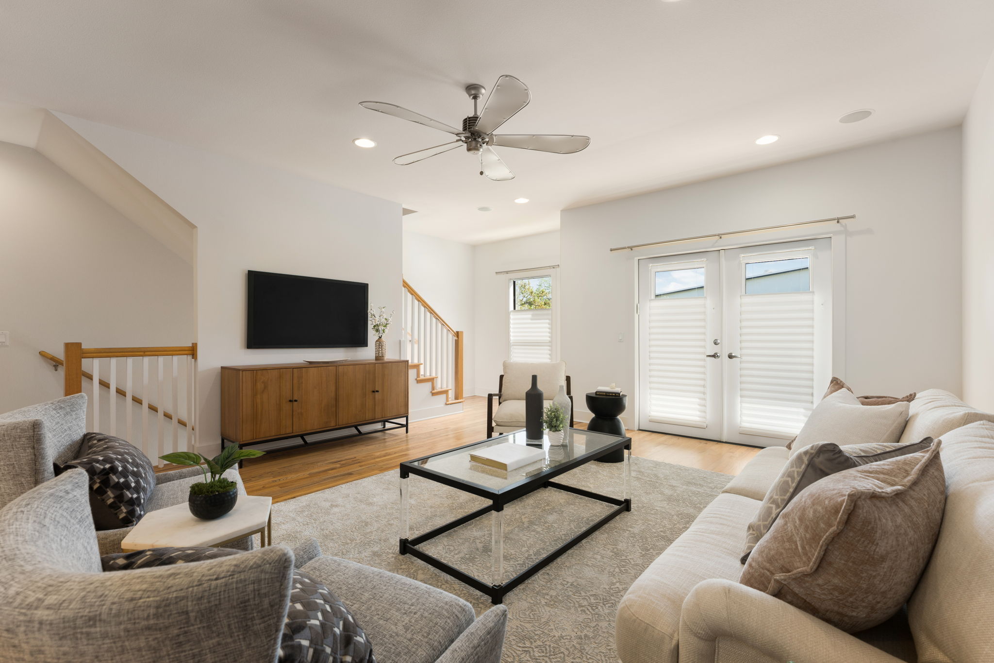 1305 Exposition Boulevard, Unit 4 Austin, TX 78703 - Photo 5 of 29 a living room with furniture and a flat screen tv