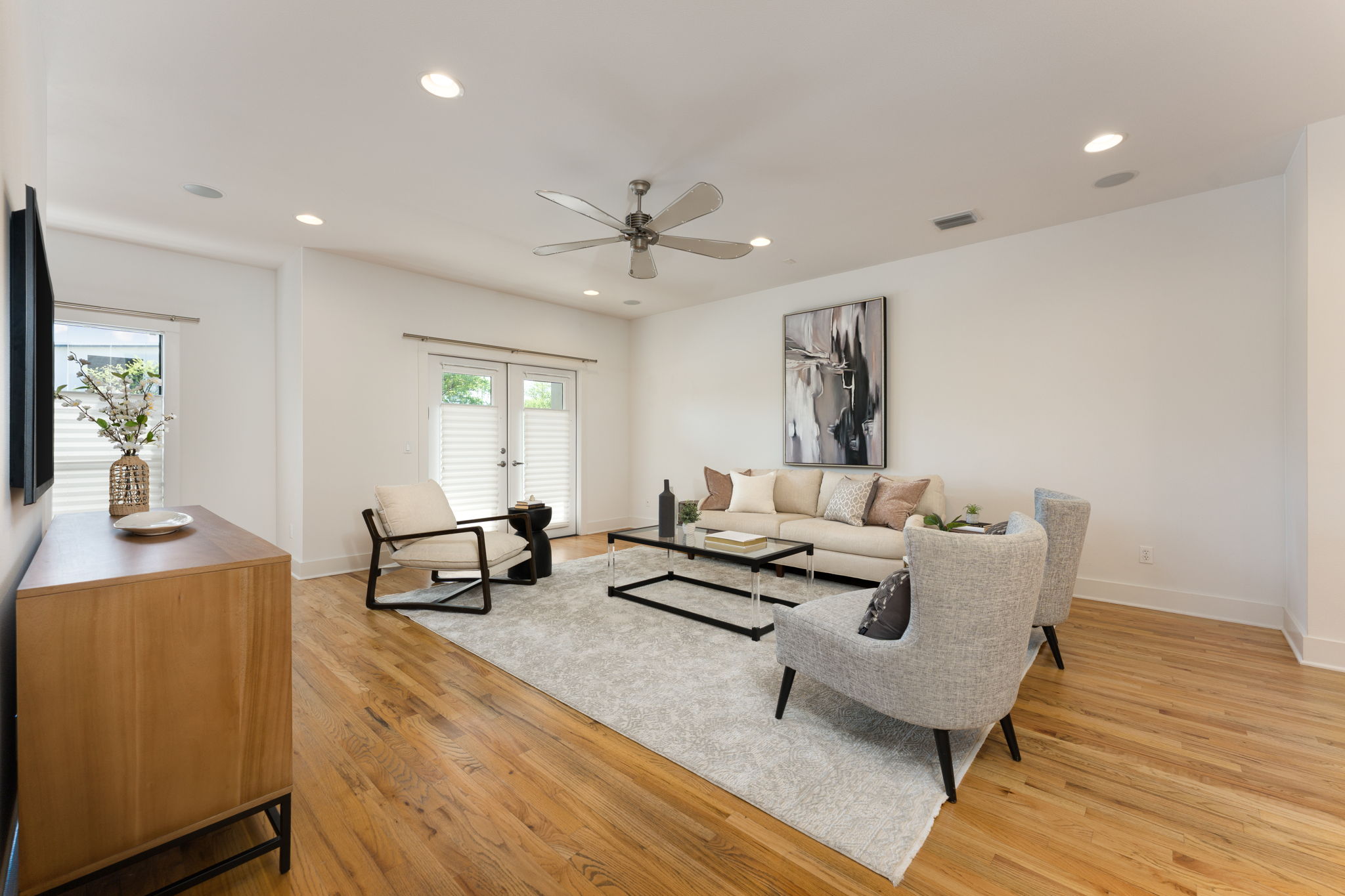 1305 Exposition Boulevard, Unit 4 Austin, TX 78703 - Photo 8 of 29 a living room with furniture and wooden floor