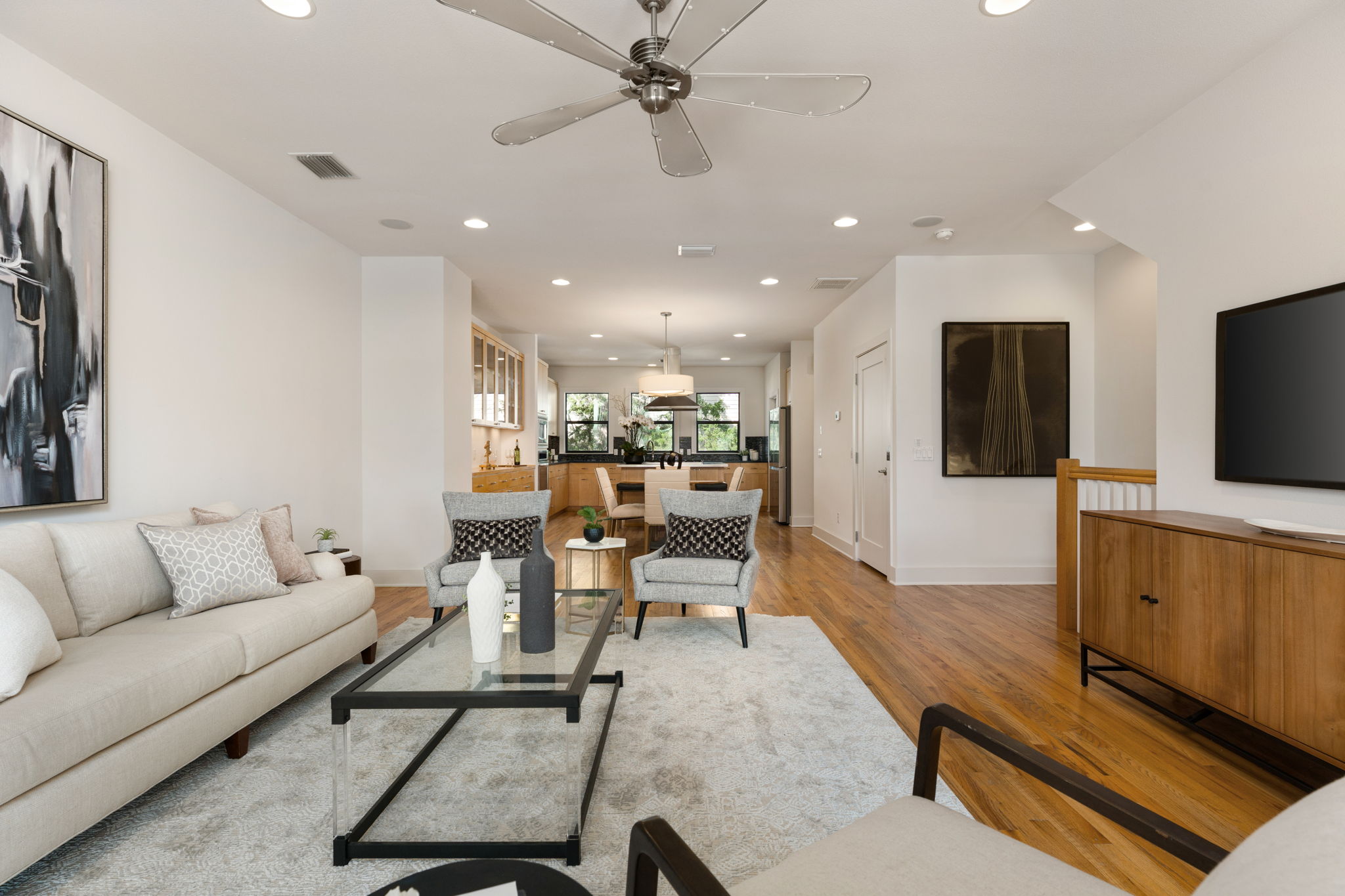1305 Exposition Boulevard, Unit 4 Austin, TX 78703 - Photo 10 of 29 a living room with furniture flat screen tv and kitchen view