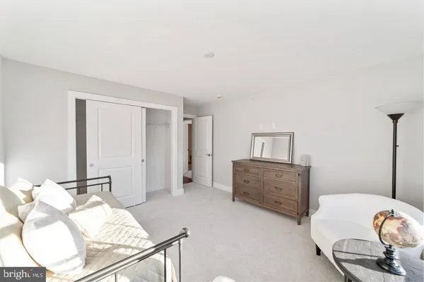 a hotel room with bed and large window