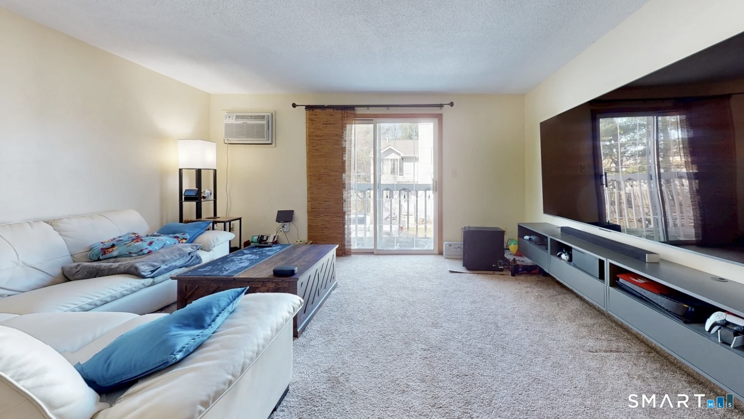 26-5 Guiel Place, Unit 8 Meriden, CT 06450 - Photo 2 of 14 a living room with furniture and a window