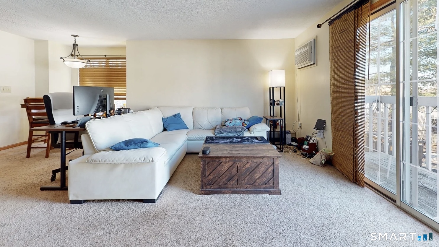 26-5 Guiel Place, Unit 8 Meriden, CT 06450 - Photo 3 of 14 a living room with furniture and a large window