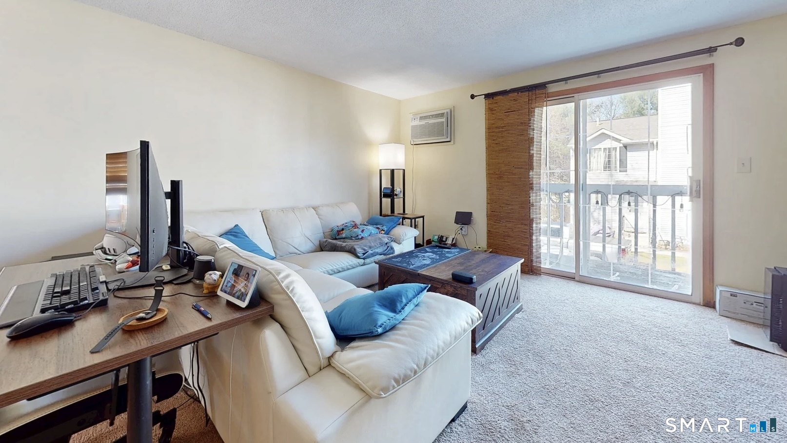 26-5 Guiel Place, Unit 8 Meriden, CT 06450 - Photo 4 of 14 a living room with furniture and a window