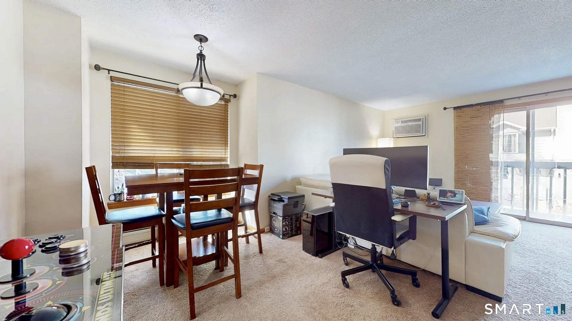 26-5 Guiel Place, Unit 8 Meriden, CT 06450 - Photo 5 of 14 a view of a workspace with furniture and a window
