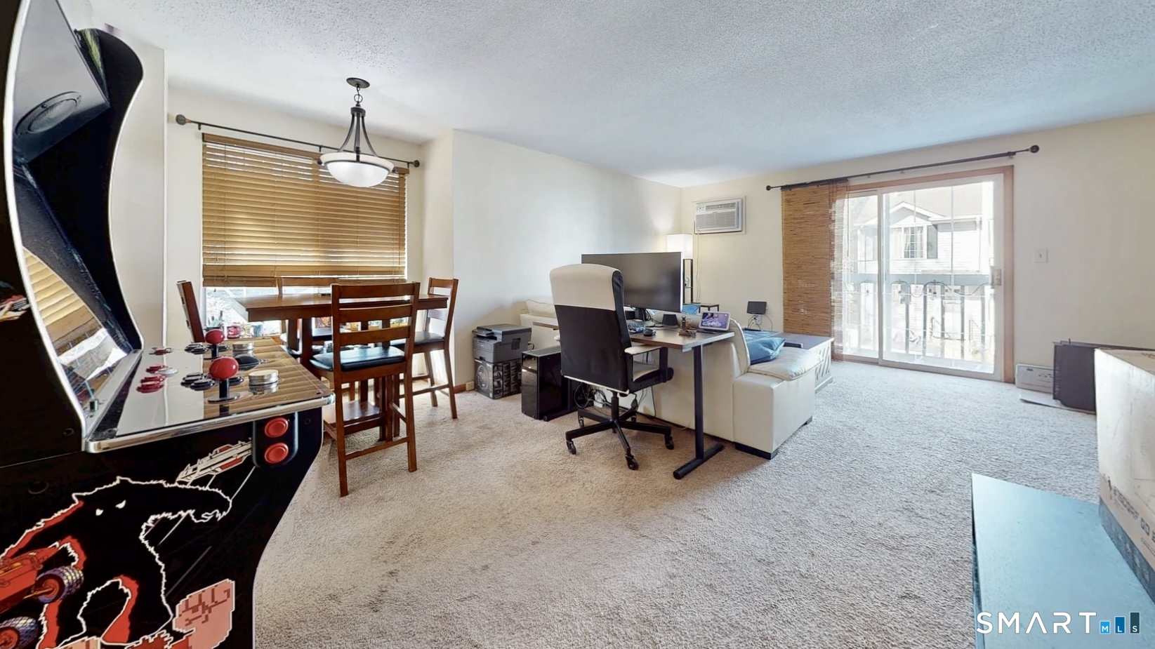 26-5 Guiel Place, Unit 8 Meriden, CT 06450 - Photo 7 of 14 a view of a livingroom with workspace and a window