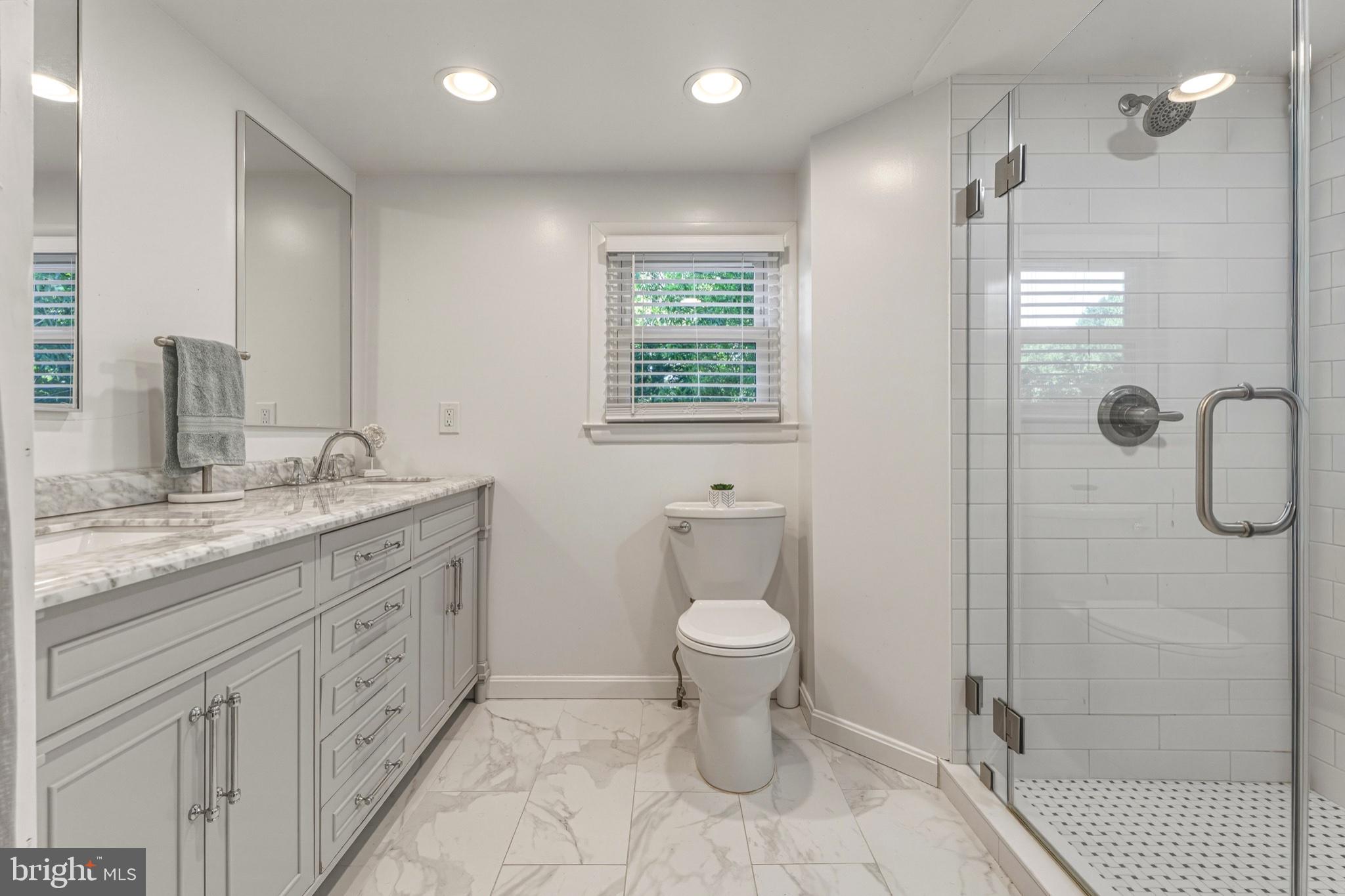 1102 Greenway Road Cockeysville, MD 21030 - Photo 28 of 47 Modern elegance in a serene bathroom.