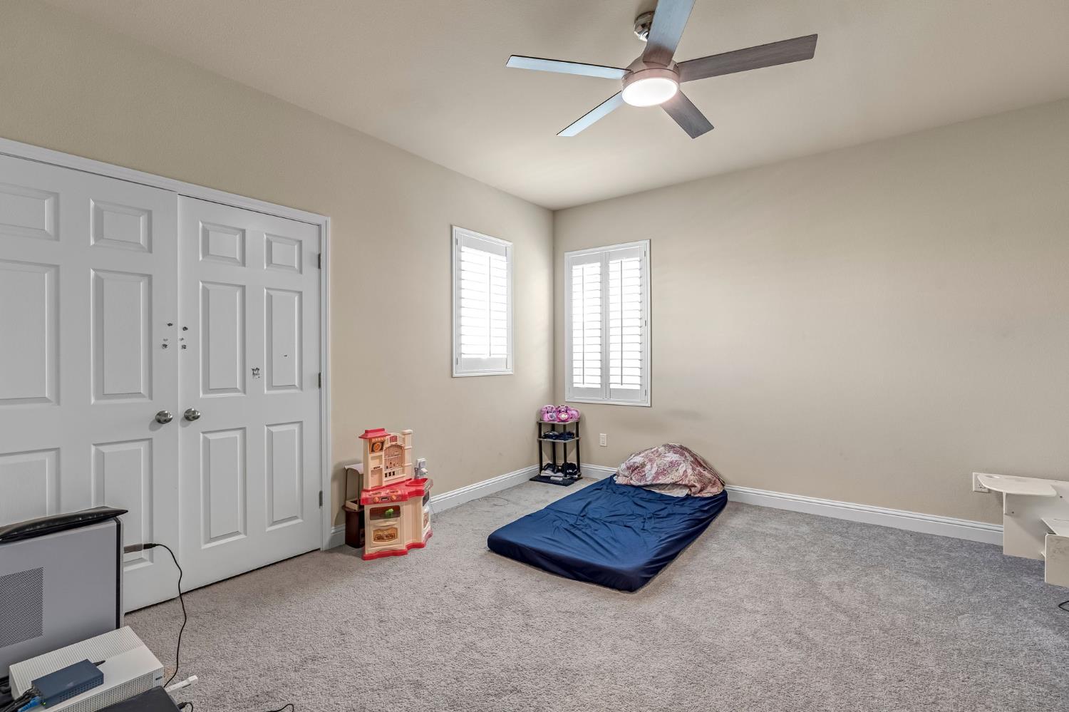 2468 Montana Avenue Clovis, CA 93619 - Photo 27 of 33 a living room with furniture and a window