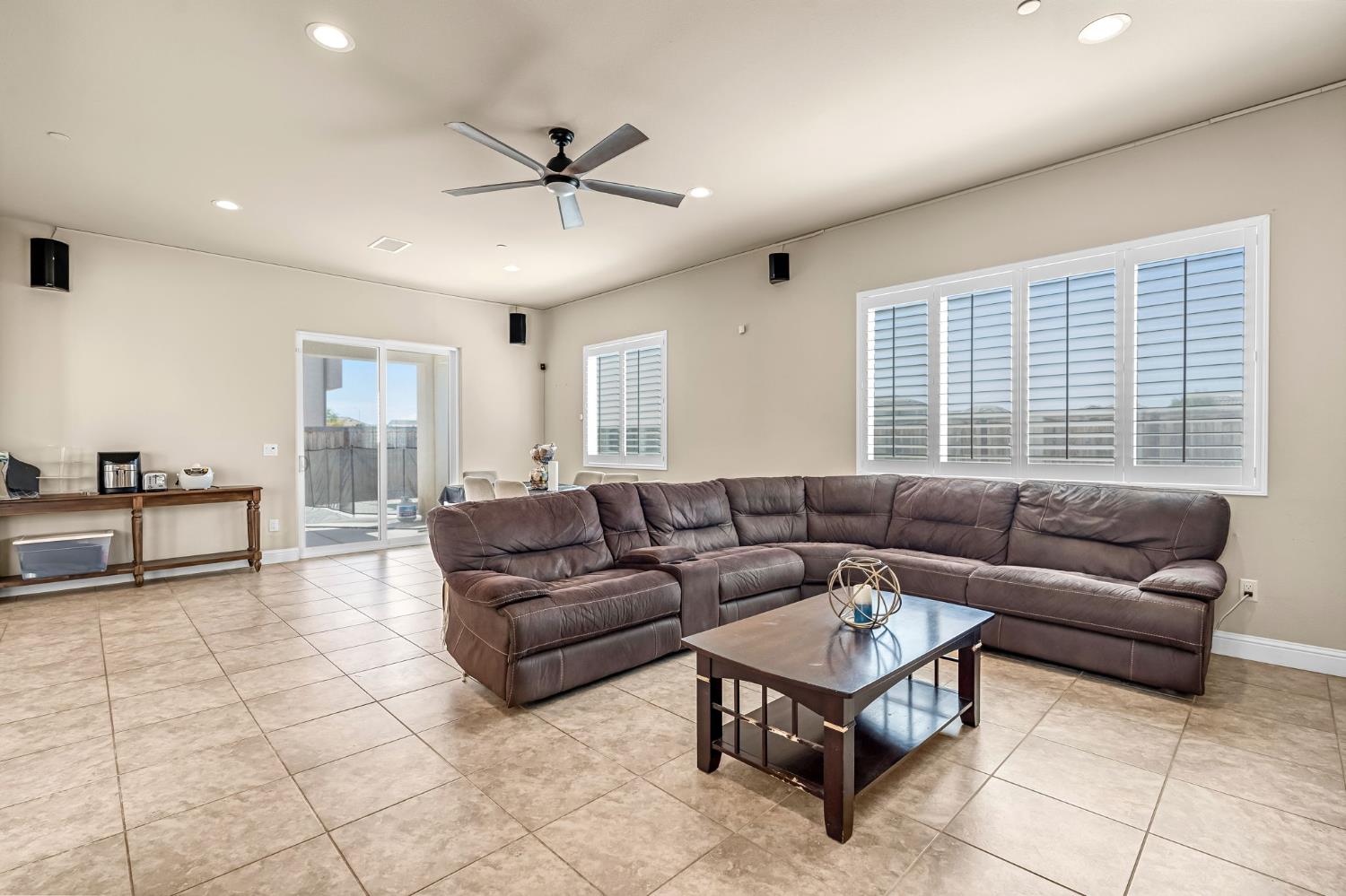 2468 Montana Avenue Clovis, CA 93619 - Photo 8 of 33 a living room with furniture and a large window