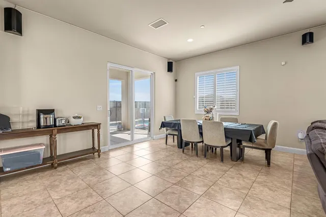 a view of a livingroom with furniture and window