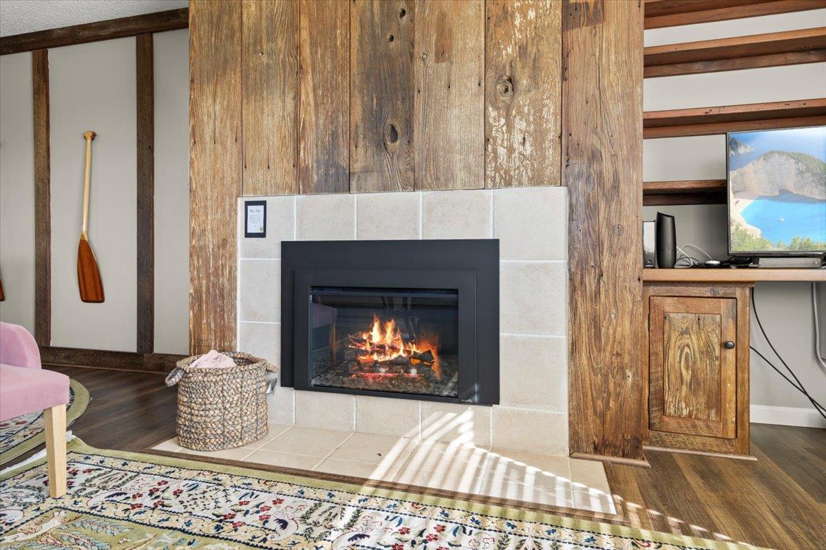 101 Shell Road, Unit 211 Watsonville, CA 95076 - Photo 15 of 29 a living room with furniture and a fireplace