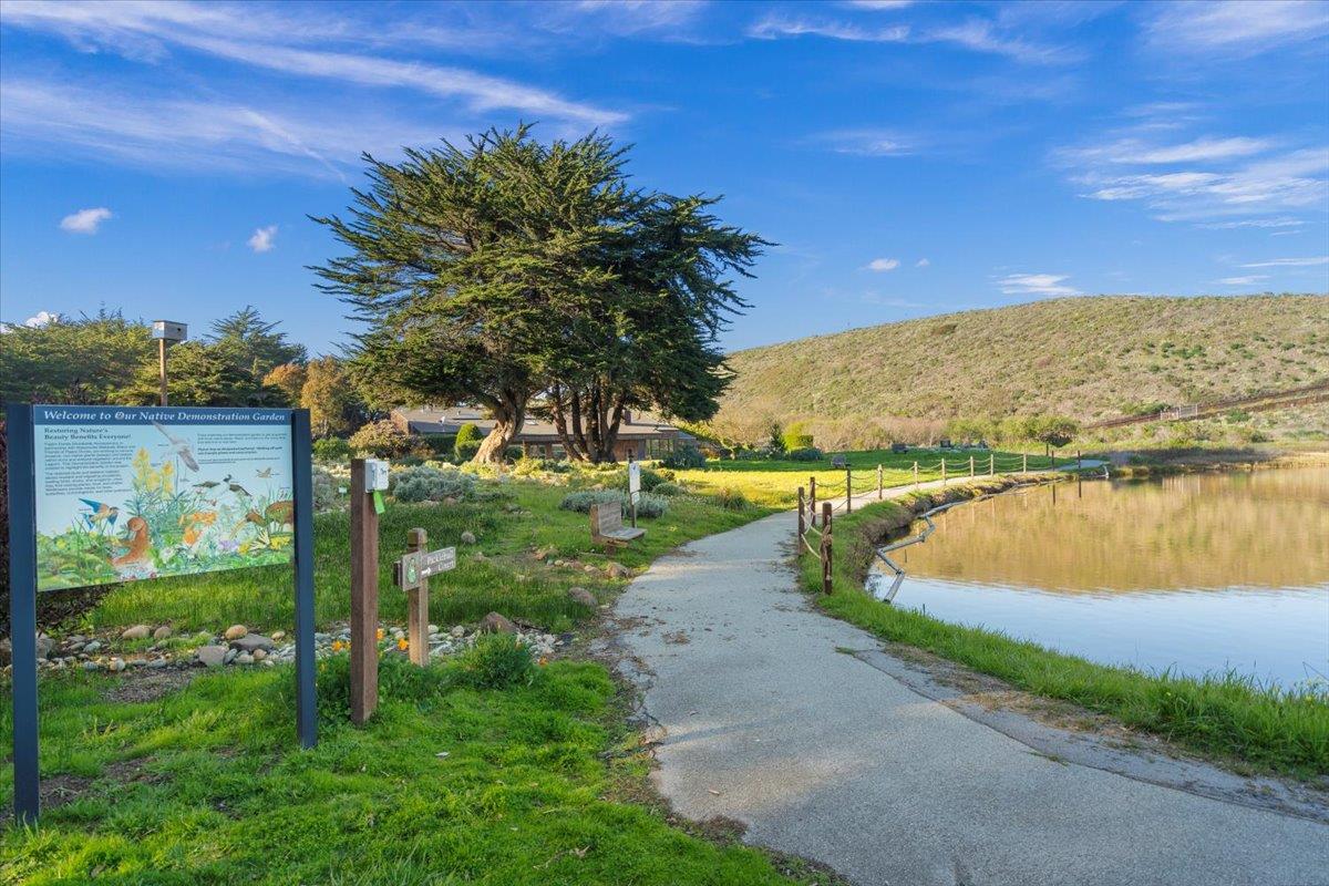 101 Shell Road, Unit 211 Watsonville, CA 95076 - Photo 22 of 29 a view of a lake with a yard