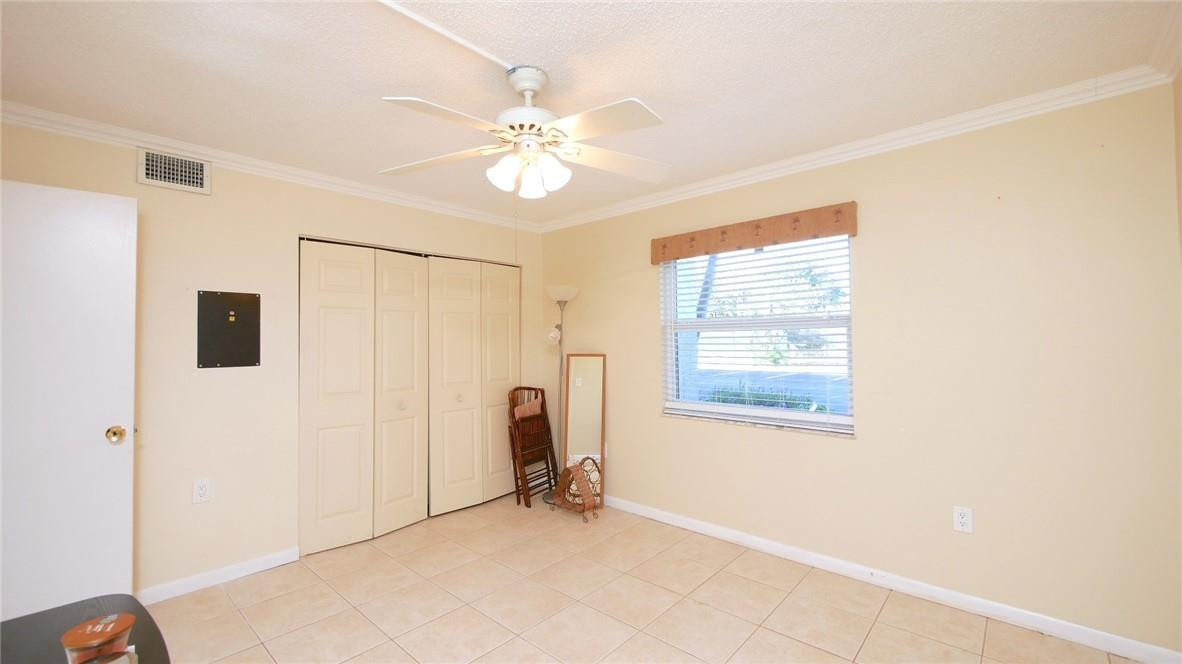 3930 Inverrary Boulevard, Unit 105D Lauderhill, FL 33319 - Photo 27 of 46 a view of an empty room with a window