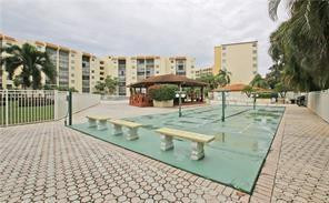 3930 Inverrary Boulevard, Unit 105D Lauderhill, FL 33319 - Photo 30 of 46 a view of a terrace with wooden floor and seating space