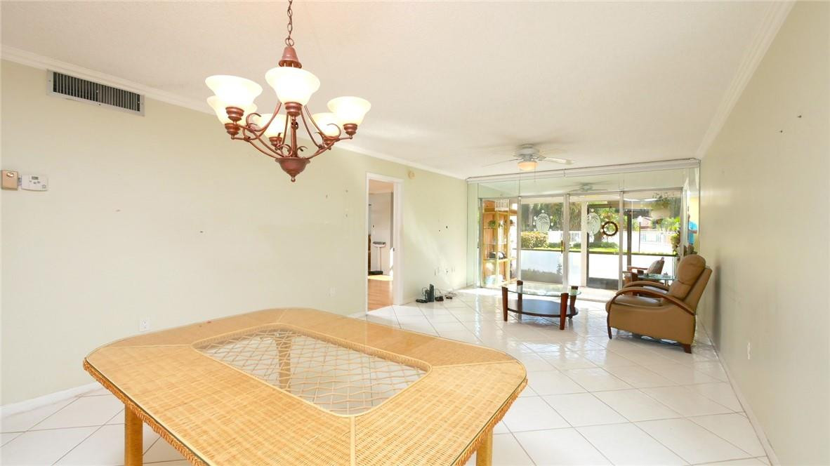 3930 Inverrary Boulevard, Unit 105D Lauderhill, FL 33319 - Photo 5 of 46 a very nice looking room with a large window