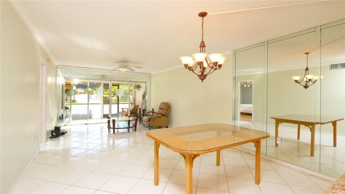 3930 Inverrary Boulevard, Unit 105D Lauderhill, FL 33319 - Photo 6 of 46 a view of a dining room and livingroom