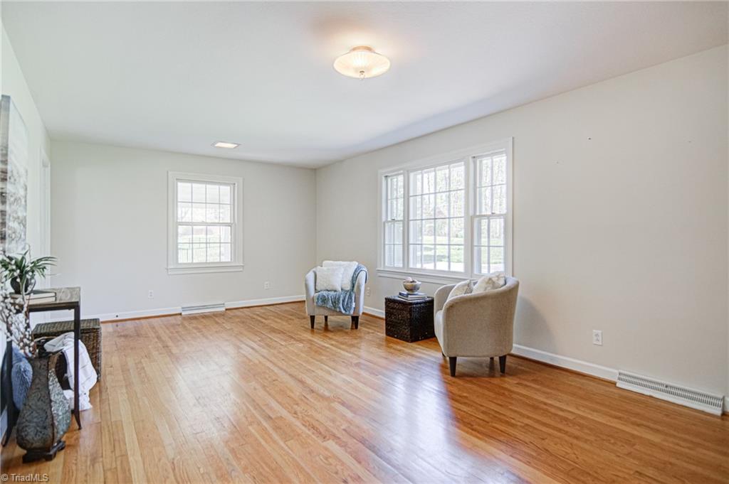 3602 Milhaven Road Winston-Salem, NC 27106 - Photo 11 of 36 Large living room space with original hardwood floors.