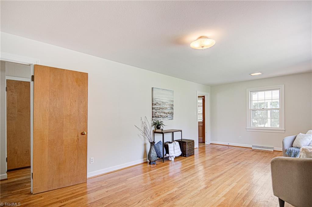 3602 Milhaven Road Winston-Salem, NC 27106 - Photo 15 of 36 This large space can double as dining and den area to gather.