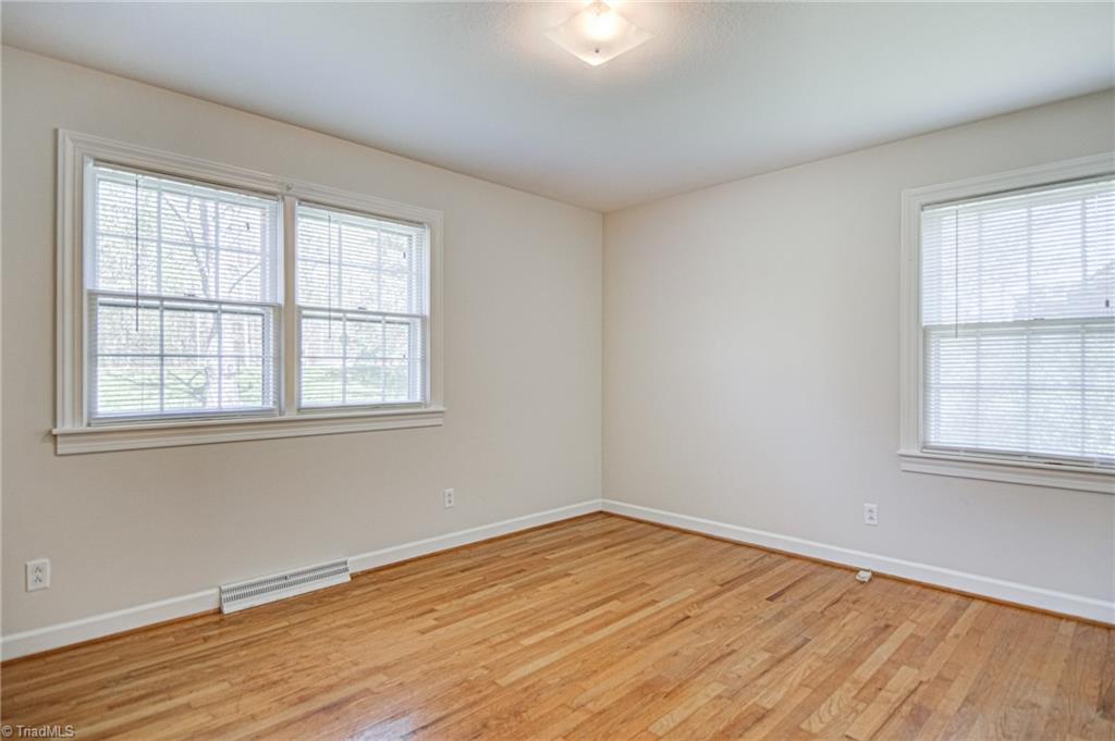 3602 Milhaven Road Winston-Salem, NC 27106 - Photo 16 of 36 Lots of natural light in the primary bedroom.