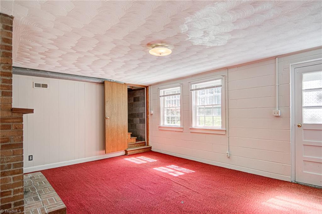 3602 Milhaven Road Winston-Salem, NC 27106 - Photo 26 of 36 This space would make a great playroom, office, or another den area.