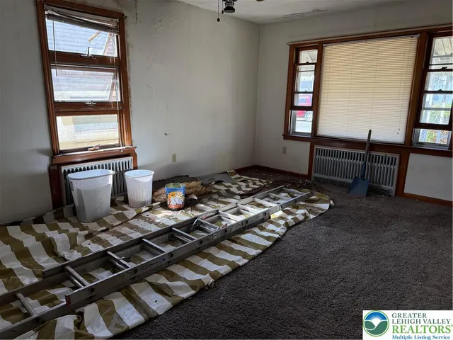 a bathroom with a sink and a window