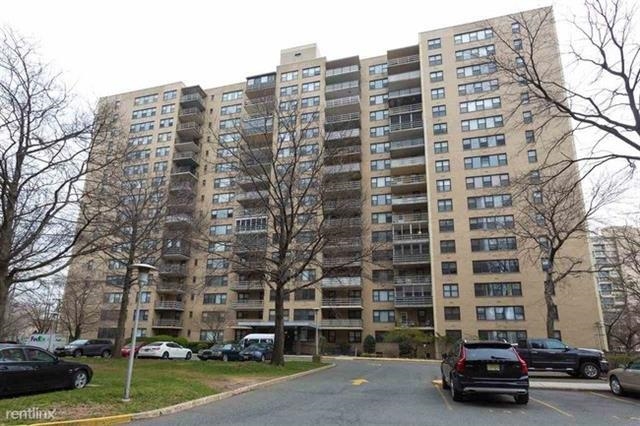 201 St Pauls Avenue, Unit 1502 Jersey City, NJ 07306 - Photo 1 of 6 front view of a building with a street