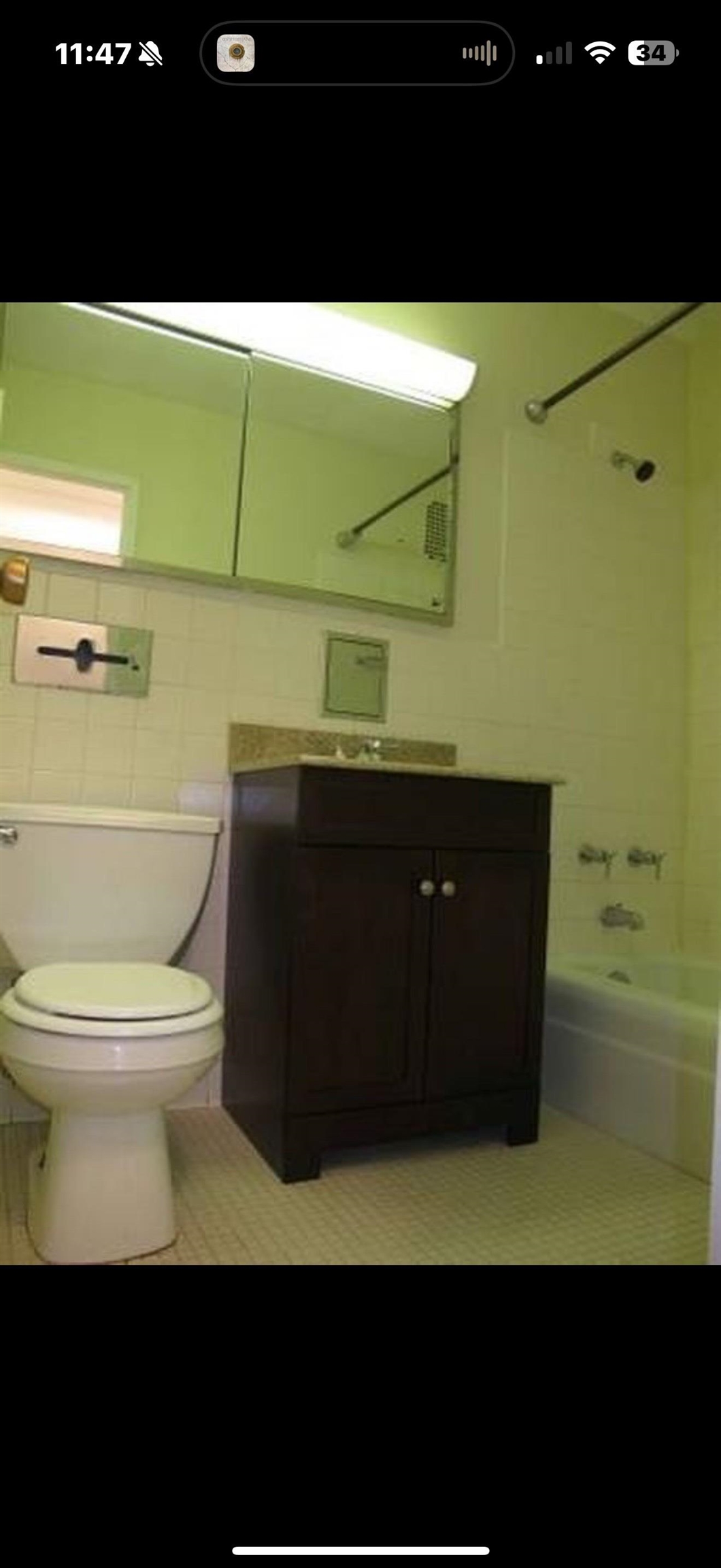 201 St Pauls Avenue, Unit 1502 Jersey City, NJ 07306 - Photo 4 of 6 a bathroom with a toilet