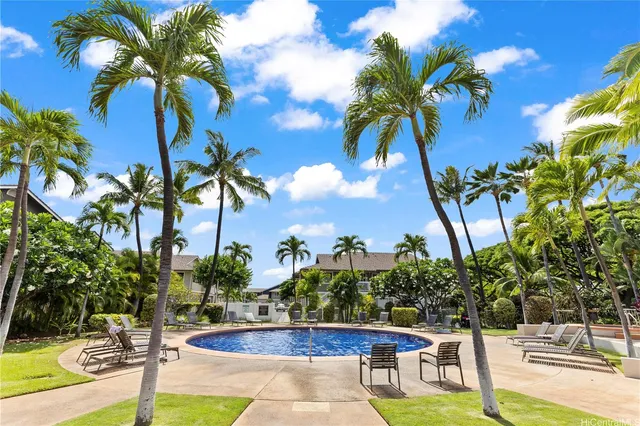 a view of a swimming pool with a garden