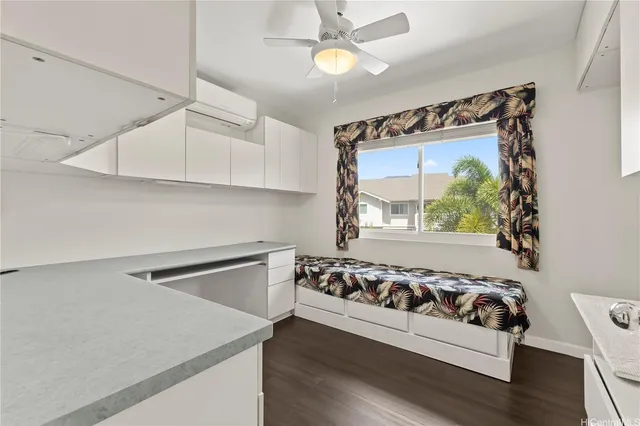 a view of kitchen with furniture and window
