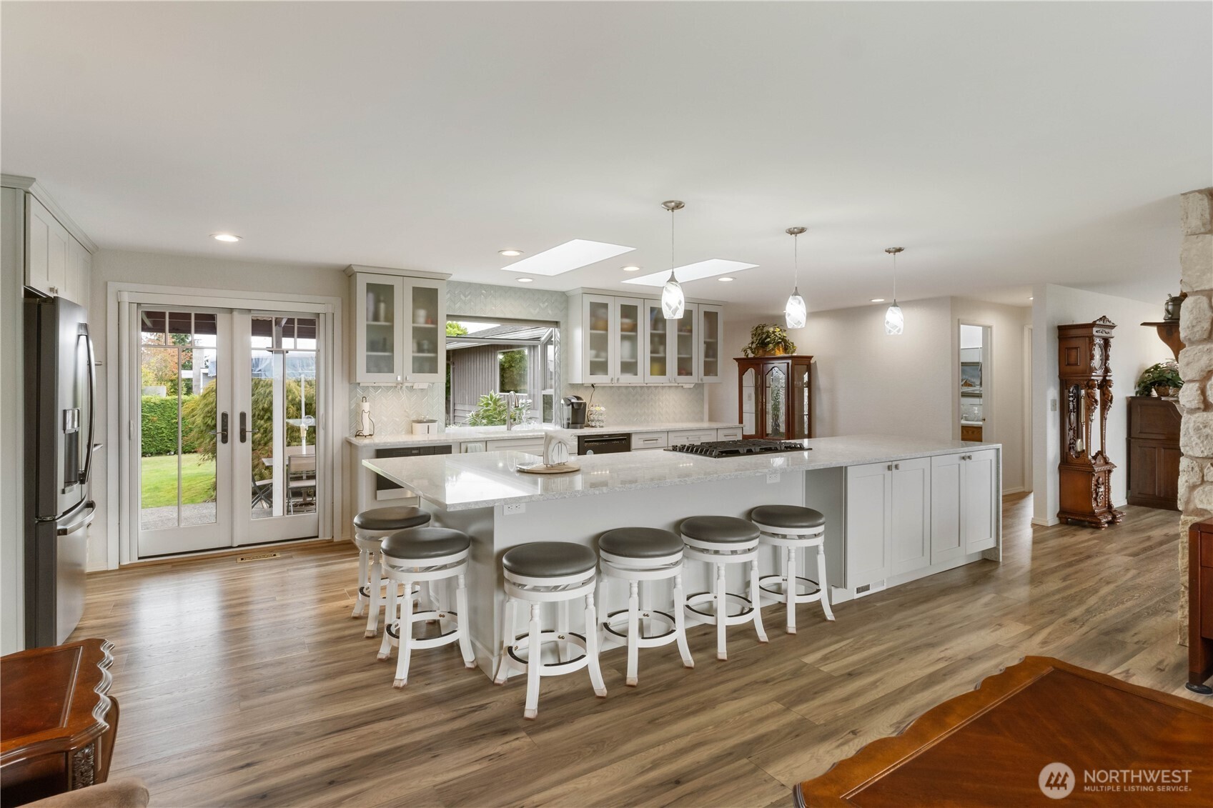 4911 Mildred Street Tacoma, WA 98407 - Photo 12 of 40 a view of a dining room with furniture and wooden floor