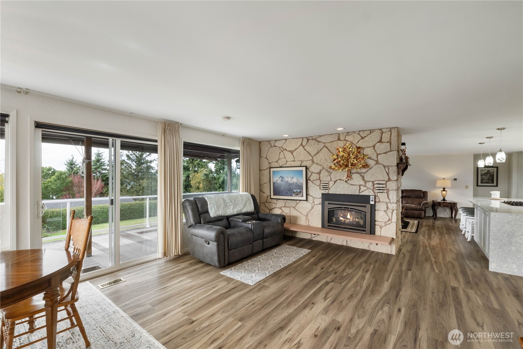 4911 Mildred Street Tacoma, WA 98407 - Photo 15 of 40 a living room with furniture and a fireplace